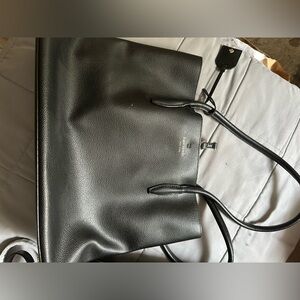 Black Kate Spade tote bag.